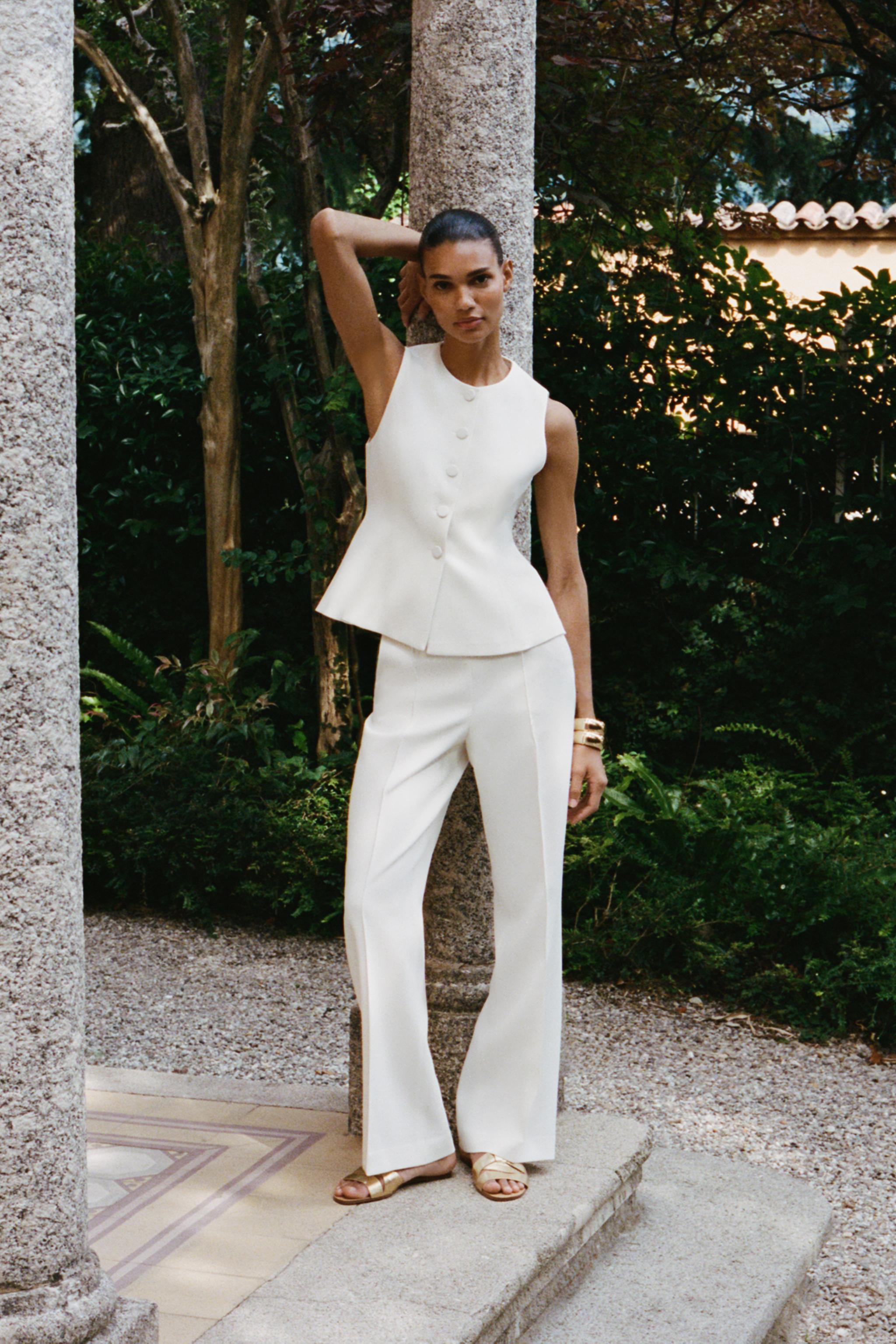 PEPLUM VEST