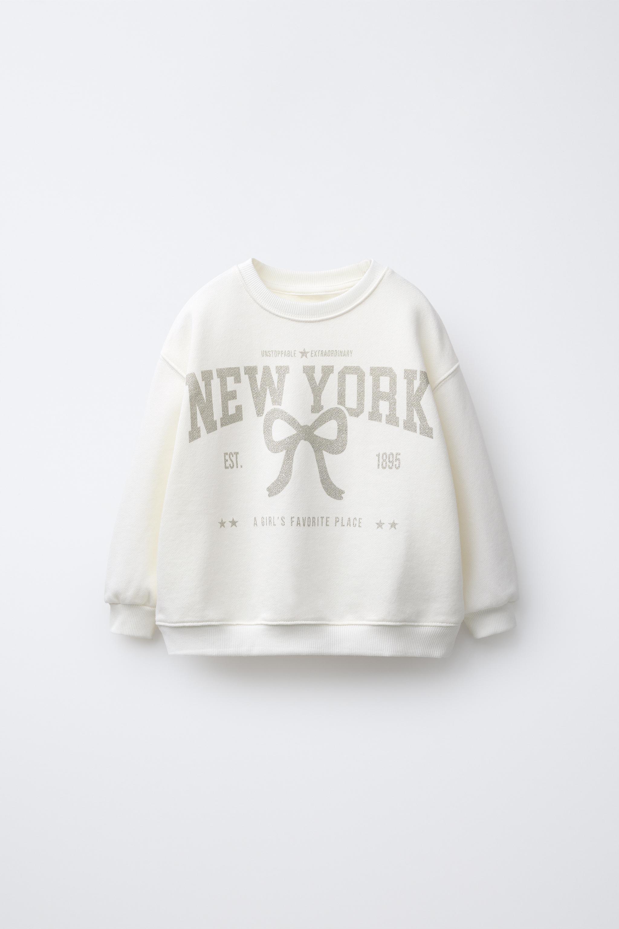 CITY GLITTER SWEATSHIRT