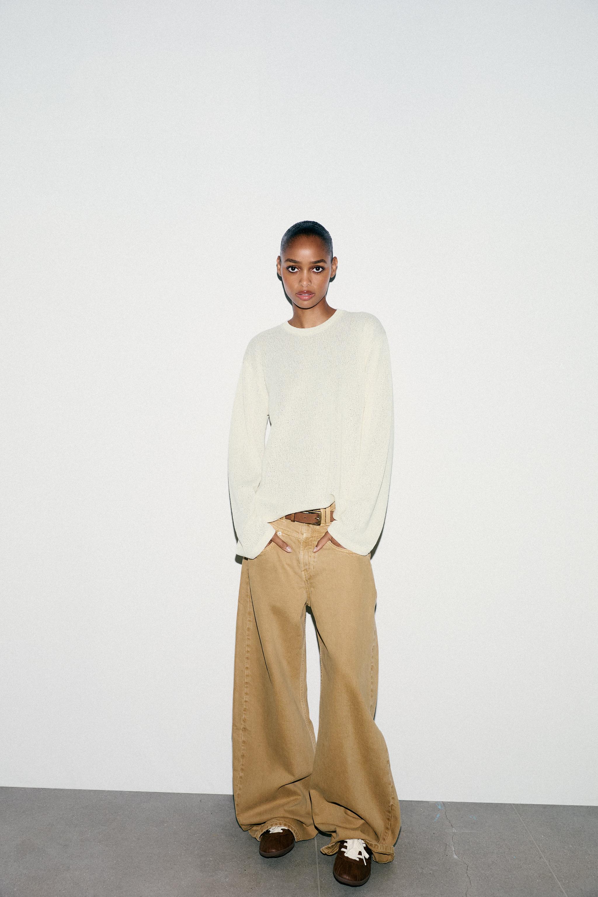 CUT-OUT KNIT SWEATER