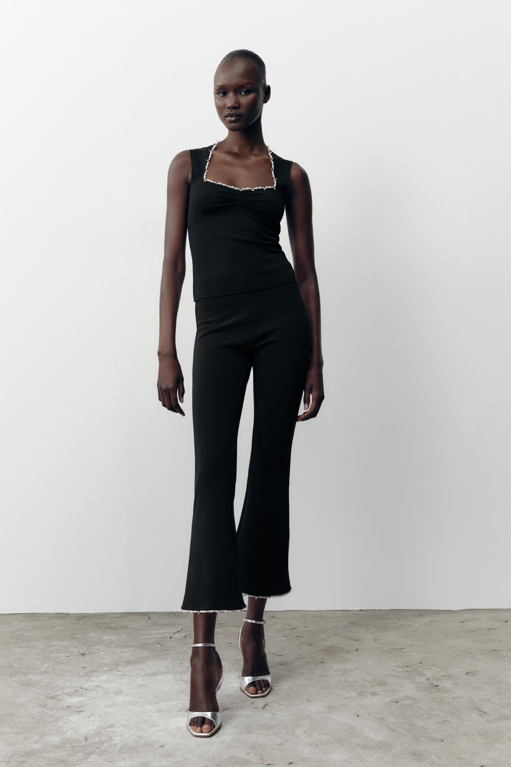 STRETCH TOP WITH METALLIC THREAD