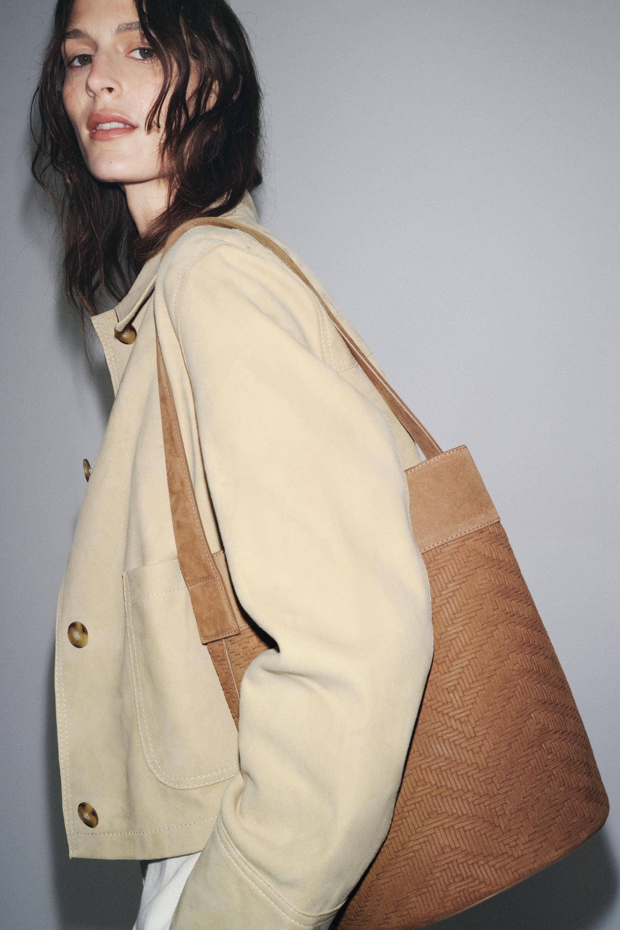 LEATHER BRAIDED MAXI BUCKET BAG