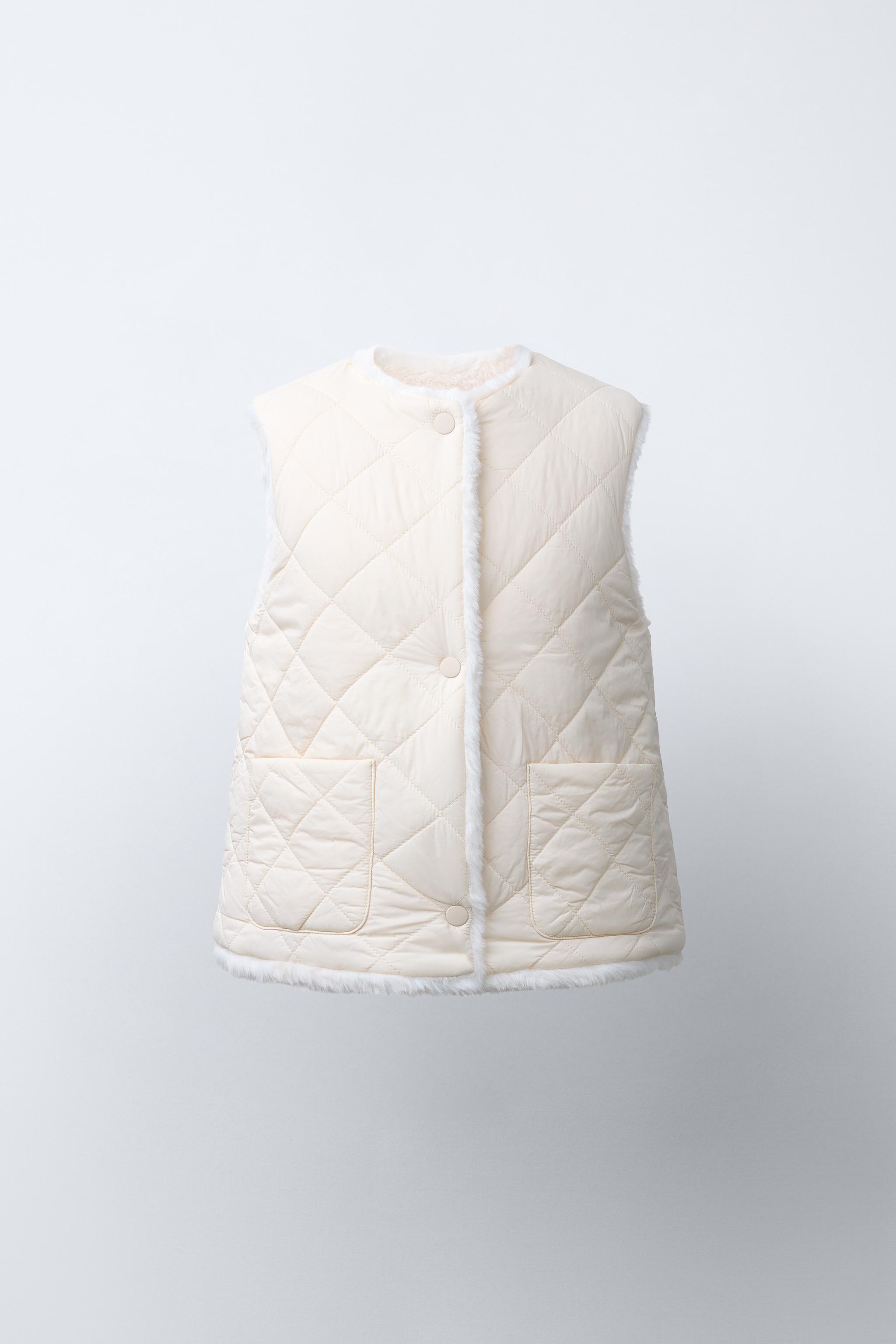 REVERSIBLE FAUX FUR VEST