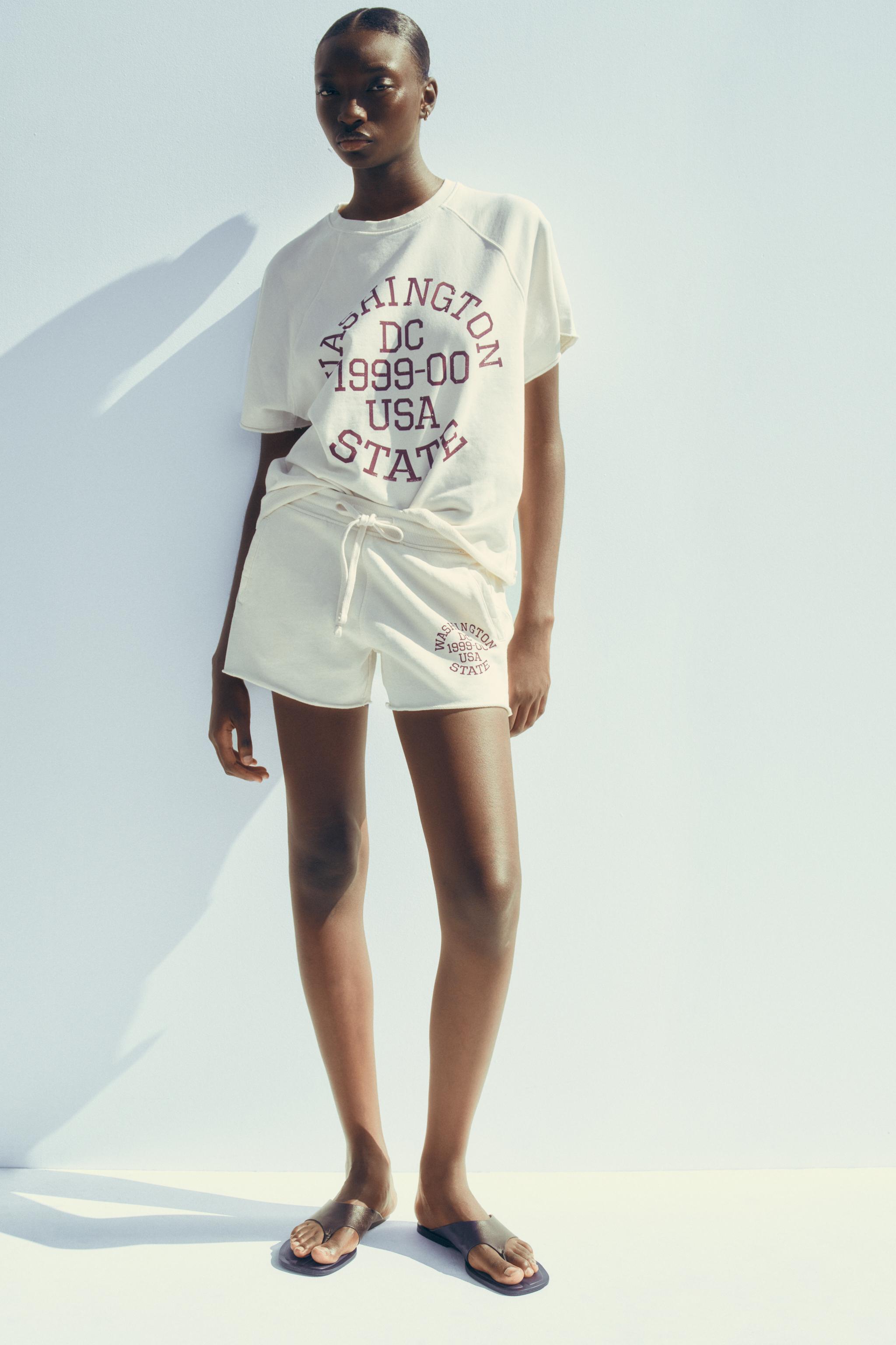 WASHED EFFECT TEXT PLUSH SWEATSHIRT
