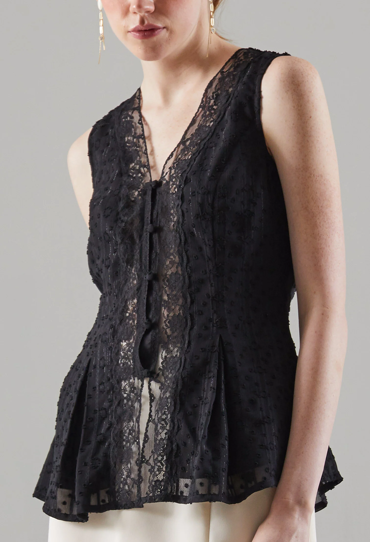 Flared Waistline Sleeveless Top