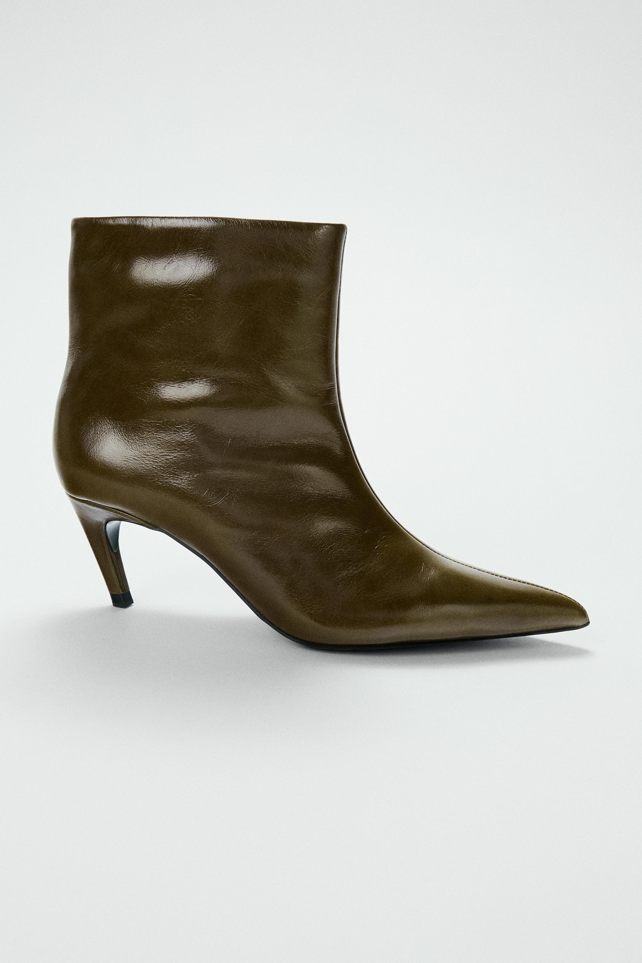 LEATHER CURVED HEEL ANKLE BOOTS