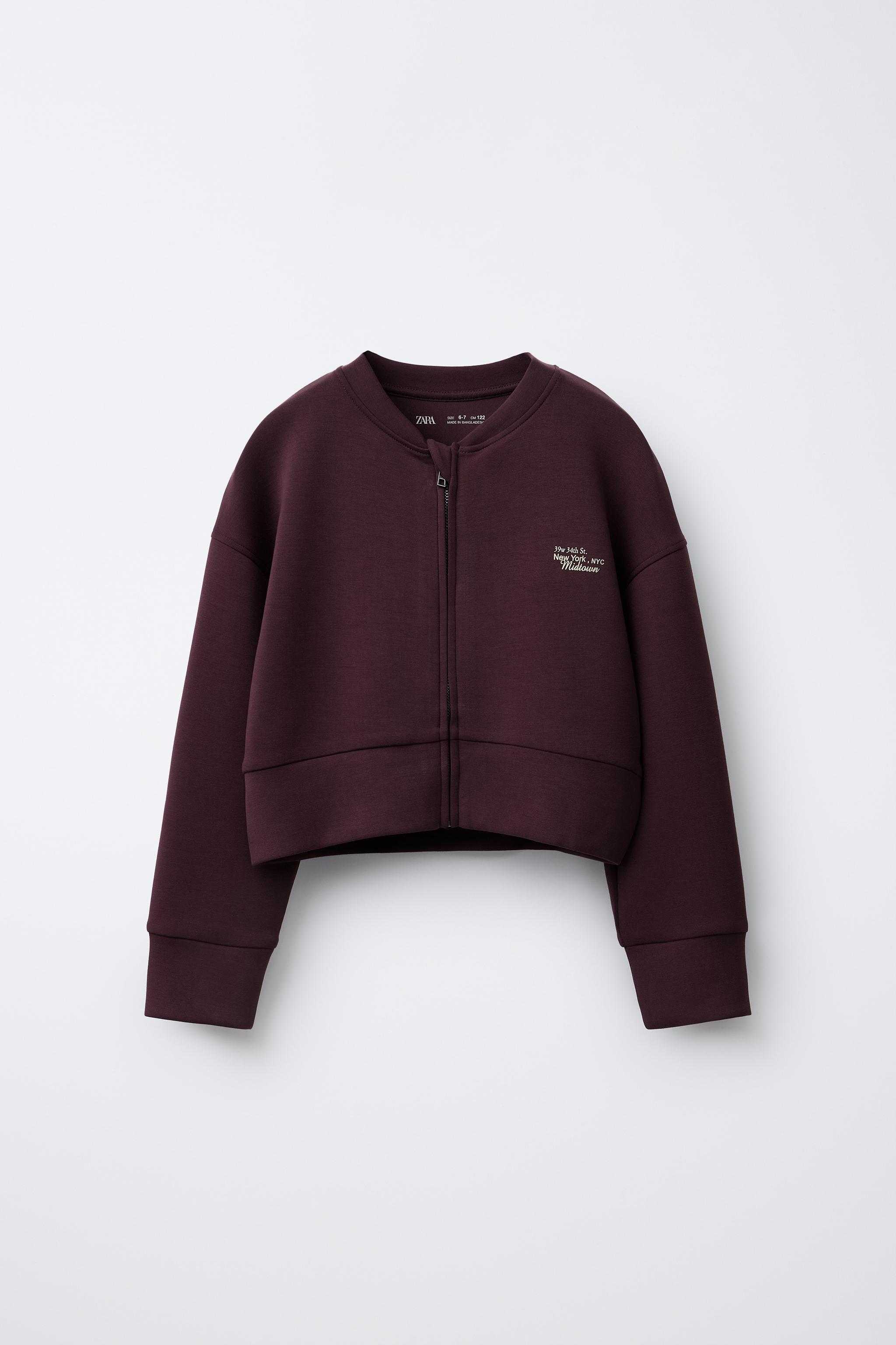 BOMBER JACKET WITH MODAL EMBOSSED TEXT